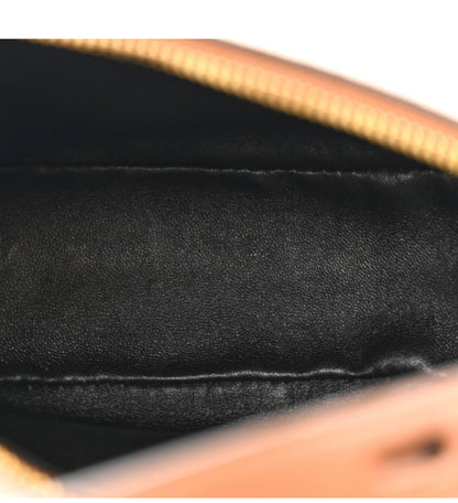 PRADA 
Soft Calfskin Arque Shoulder Bag Cognac