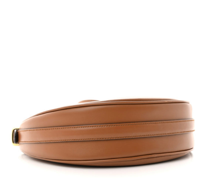 PRADA 
Soft Calfskin Arque Shoulder Bag Cognac