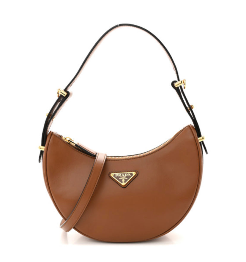 PRADA 
Soft Calfskin Arque Shoulder Bag Cognac